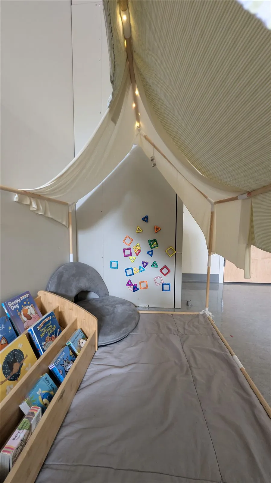 A cozy reading nook in the Caterpillar Room